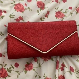 Red glitter clutch
